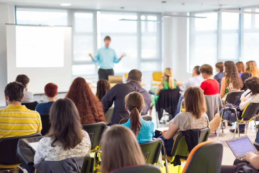 Speaker presenting to a group of people